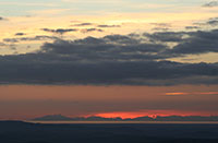 Zonsondergang metMontecristo en Corsica op de achtergrond

