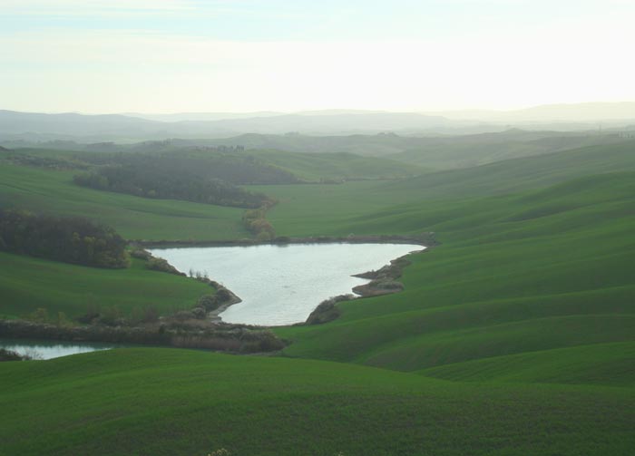 Asciano, Morning light on two lakes between Leonina and Vescona, Crete Senesi